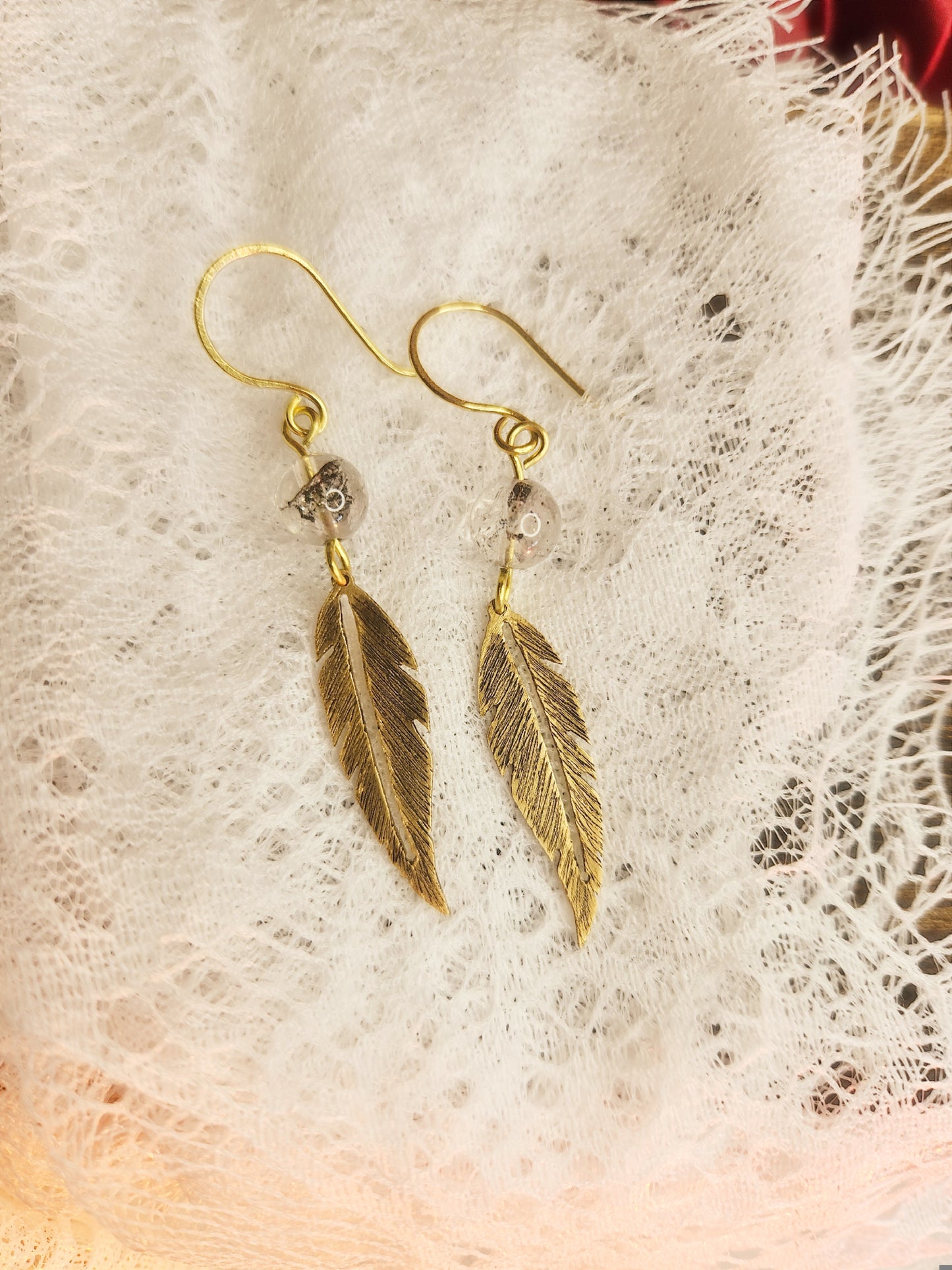 Boucles d’oreilles “Plumes Vagabondes”